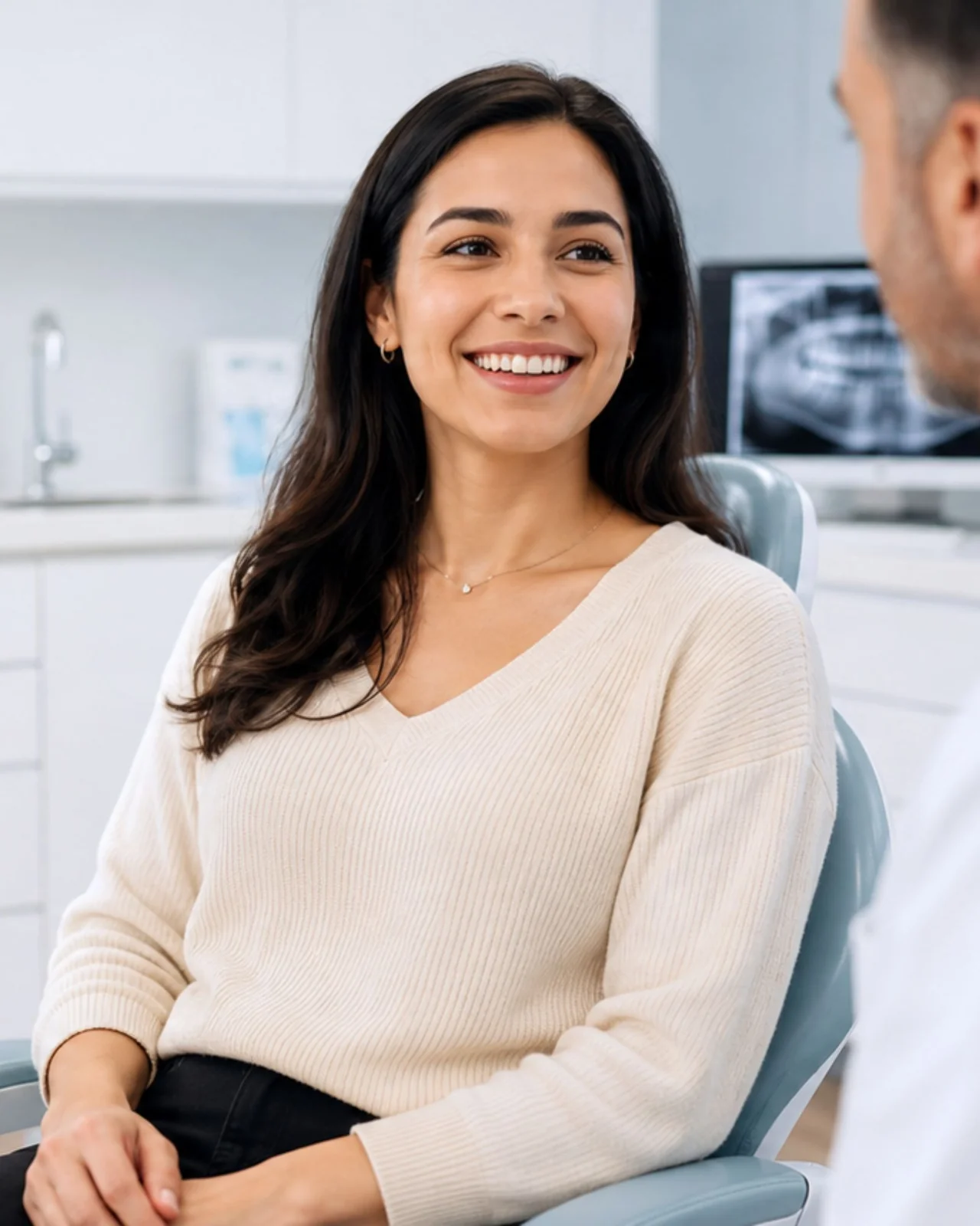 Patient and dentist reviewing a written dental implant cost estimate at Diamondback Dentistry in North Phoenix, Arizona.